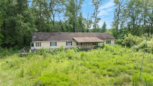 a view of a house with garden