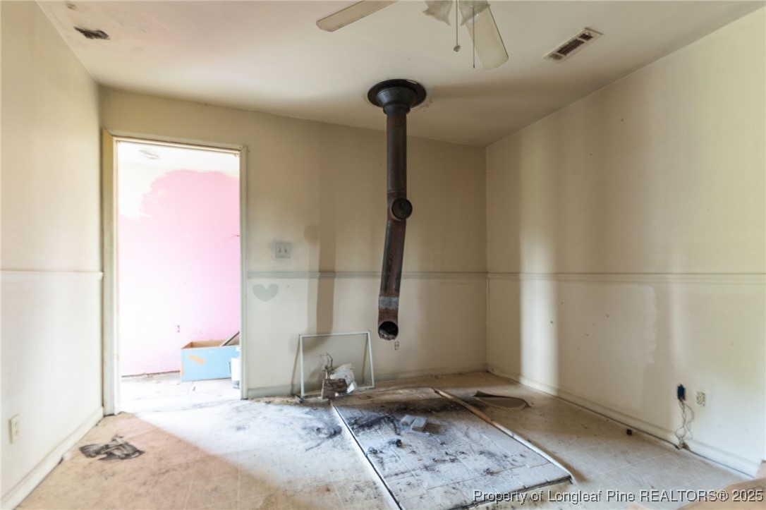 3402 Pine Log Road Lumberton, NC 28360 - Photo 8 of 24 a bathroom with a granite countertop sink and a mirror