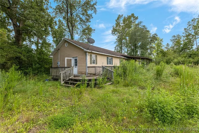 a house view with a outdoor space