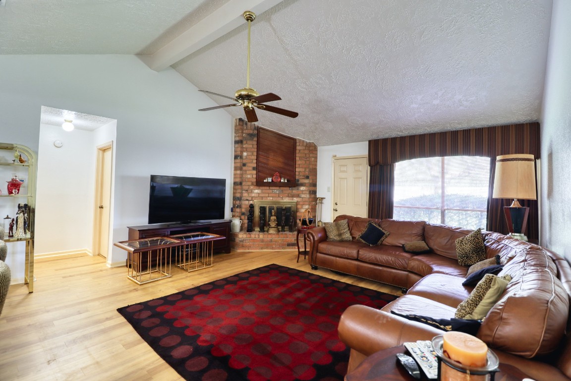 3446 Cheaney Drive Houston, TX 77066 - Photo 13 of 49 a living room with furniture and a flat screen tv
