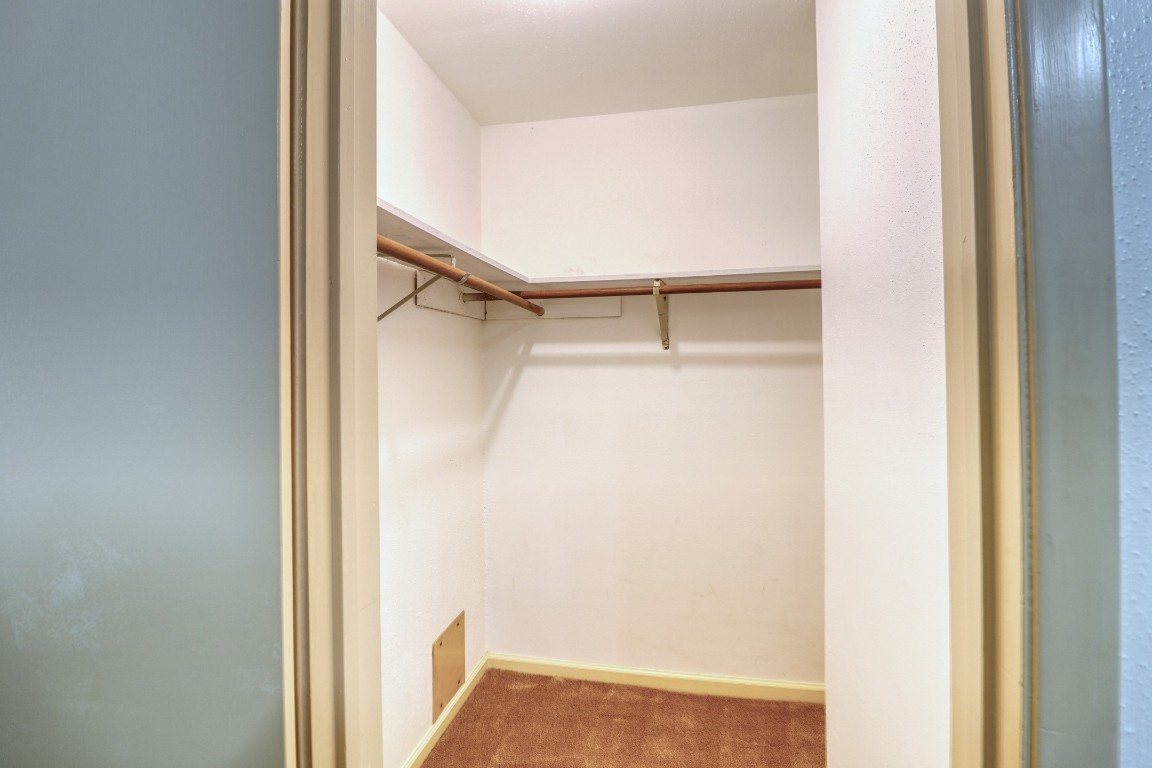 3446 Cheaney Drive Houston, TX 77066 - Photo 40 of 49 a view of walk in closet with empty racks