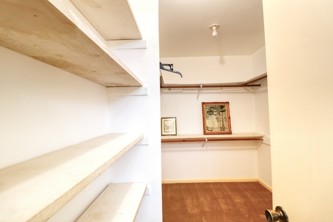 3446 Cheaney Drive Houston, TX 77066 - Photo 41 of 49 a view of a hallway with staircase