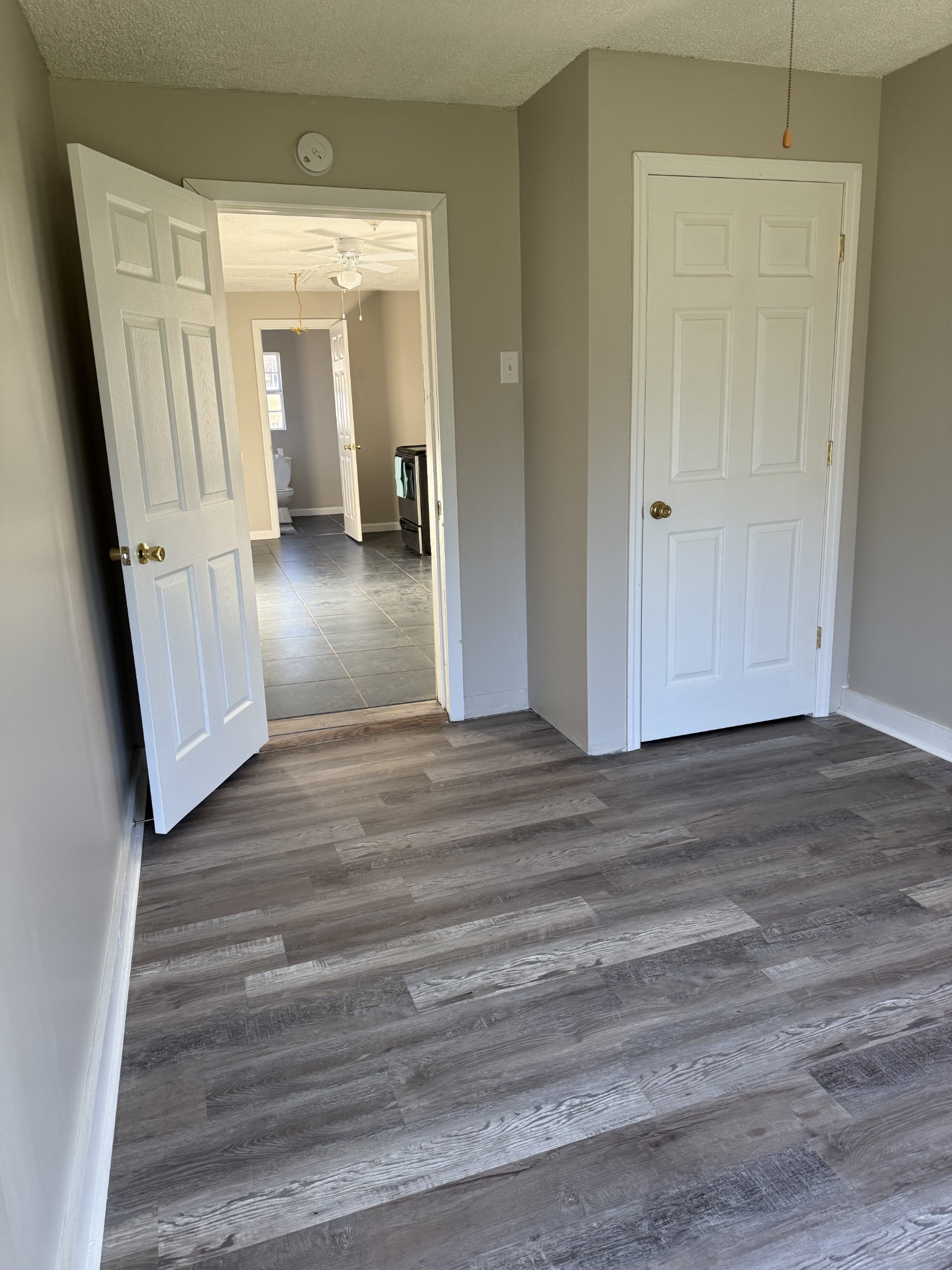 98 Ballenger Road Carthage, TN 37030 - Photo 18 of 23 a view of a hallway view with wooden floor and staircase