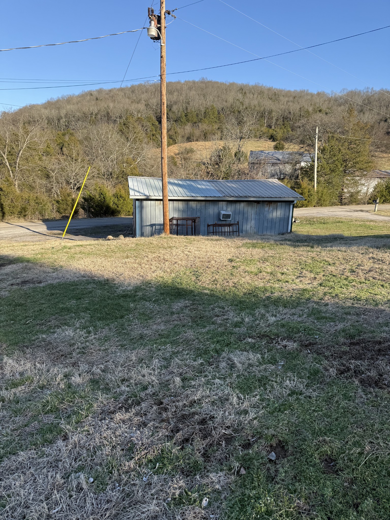98 Ballenger Road Carthage, TN 37030 - Photo 6 of 23 a front view of a house with a yard