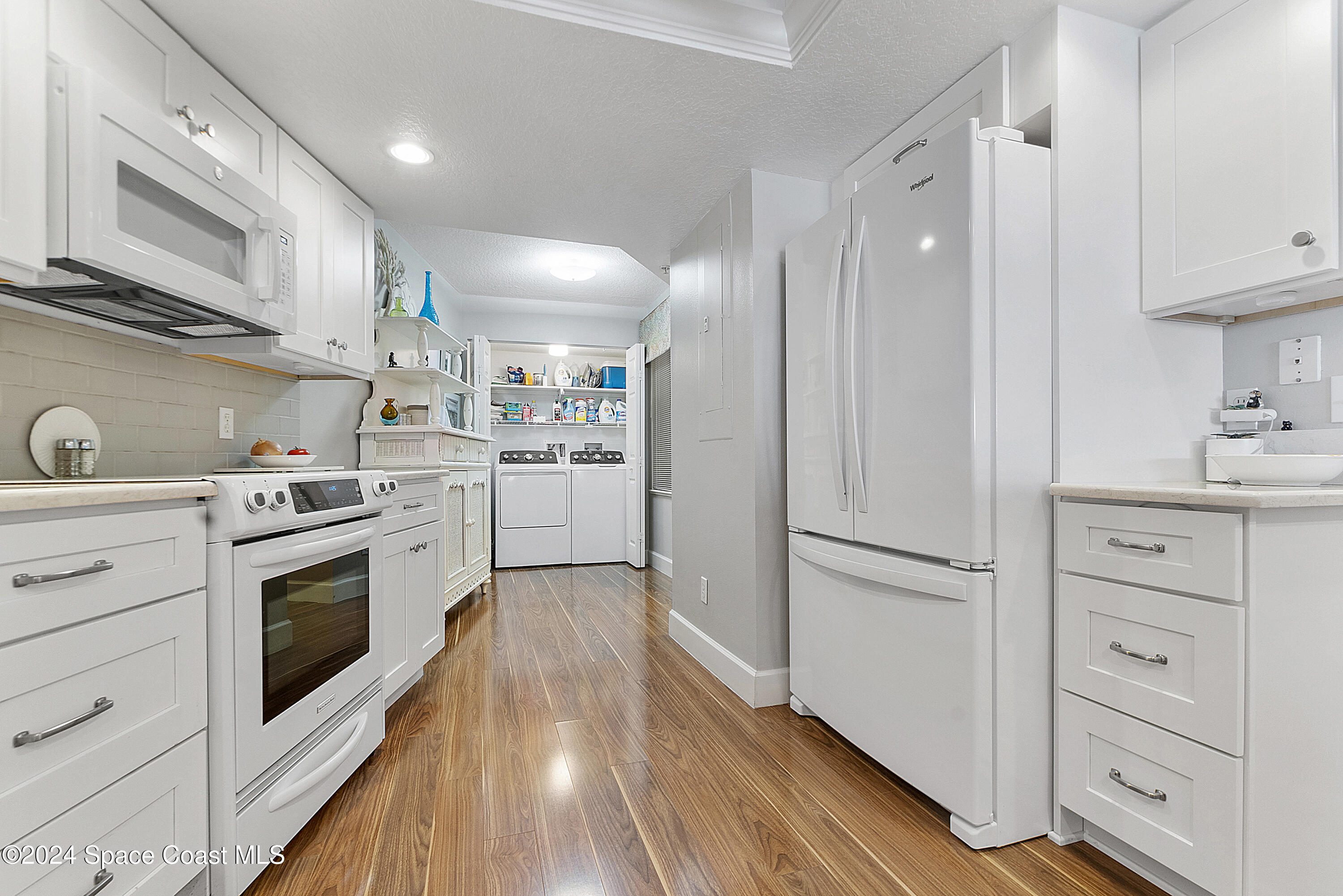 100 Riverside Drive, Unit 303 Cocoa, FL 32922 - Photo 8 of 72 Spacious kitchen with ample storage