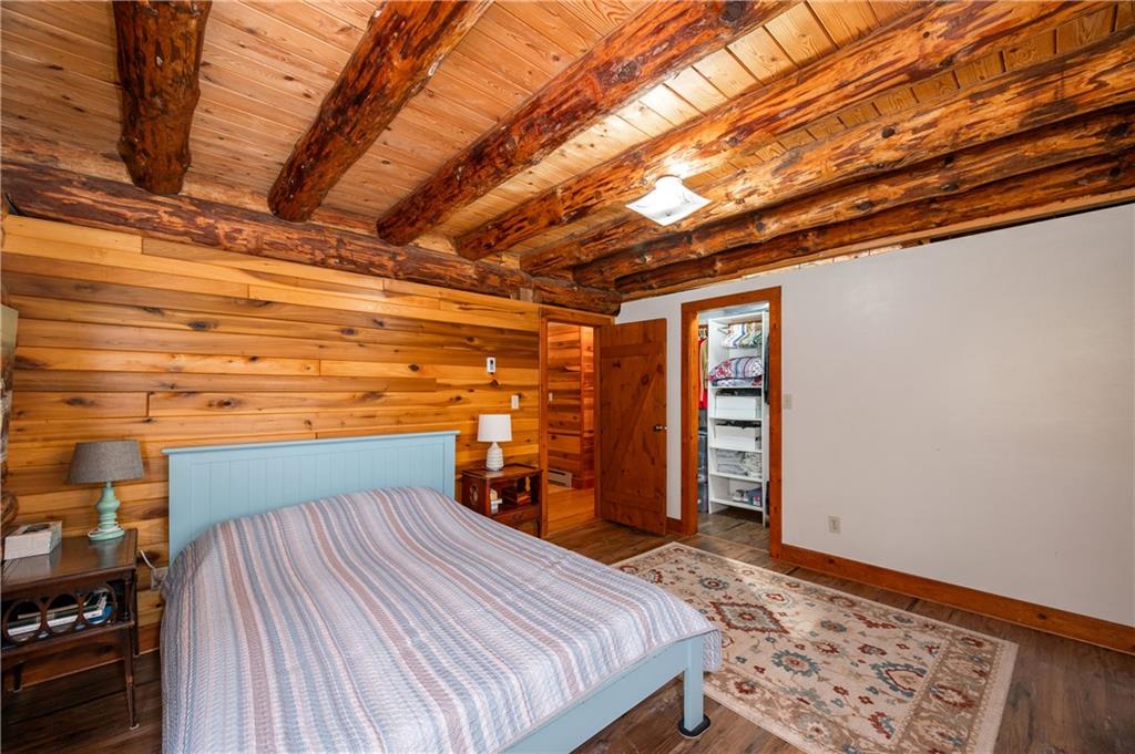 142 Cashdollar Road Mars, PA 16046 - Photo 17 of 44 a bed sitting in a bedroom next to a window