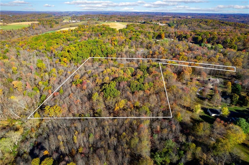 142 Cashdollar Road Mars, PA 16046 - Photo 40 of 44 a view of a room with wooden floor and city view