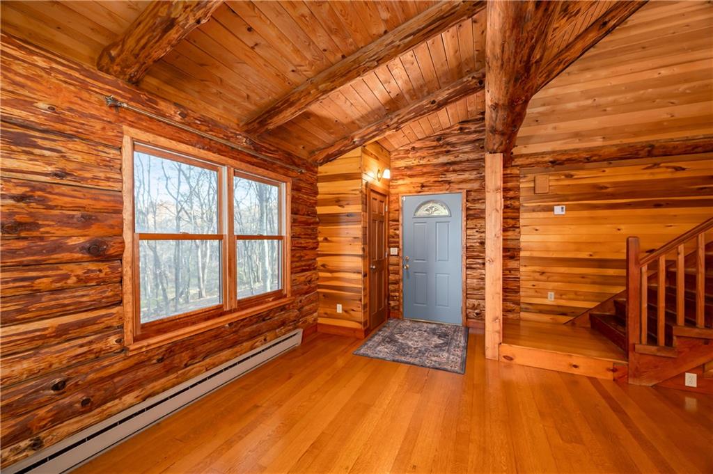 142 Cashdollar Road Mars, PA 16046 - Photo 6 of 44 a view of a room with wooden floor and windows