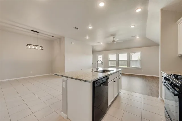 a view of a house with backyard porch and garden
