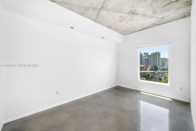 an empty room with a window