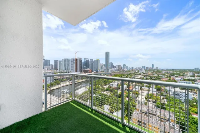 a view of city from a balcony