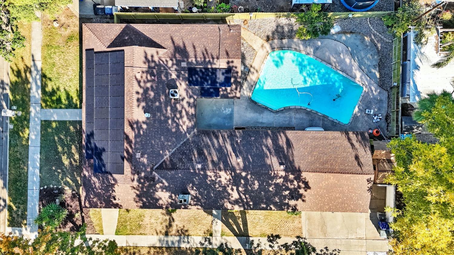 5654 North 7th Street Fresno, CA 93710 - Photo 38 of 38 an aerial view of a house with a yard