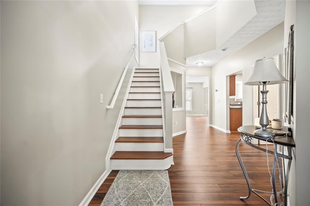 6066 Allpoint Way Fairburn, GA 30213 - Photo 11 of 43 a view of entryway with wooden floor