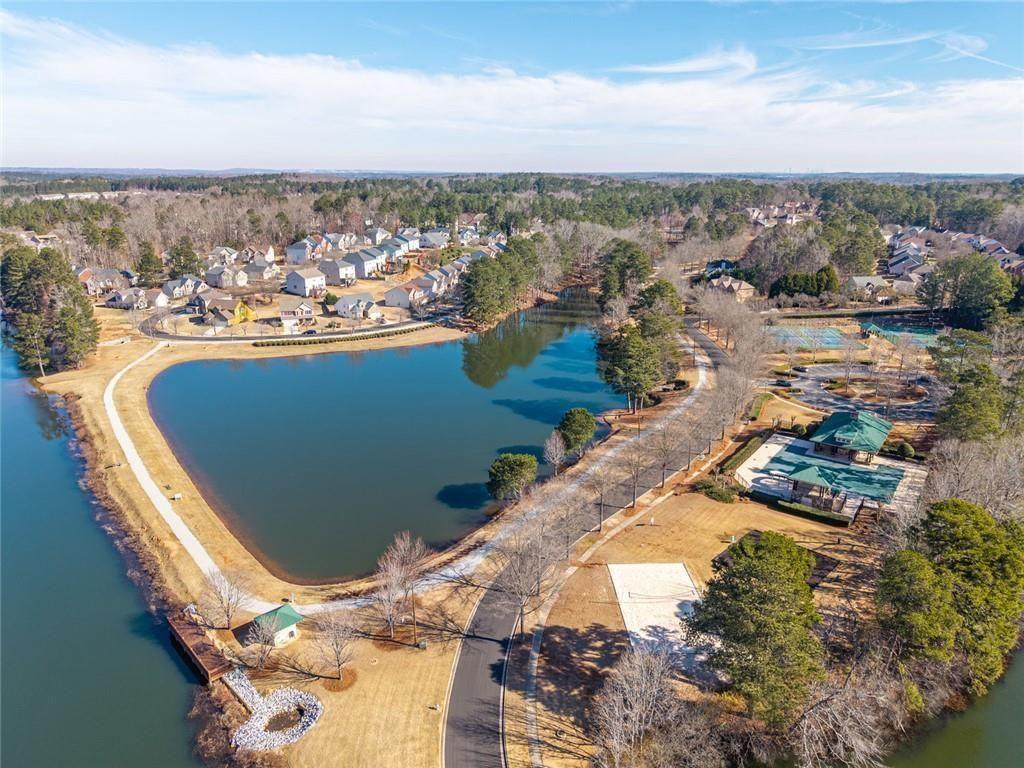 6066 Allpoint Way Fairburn, GA 30213 - Photo 37 of 43 a view of a lake with a mountain