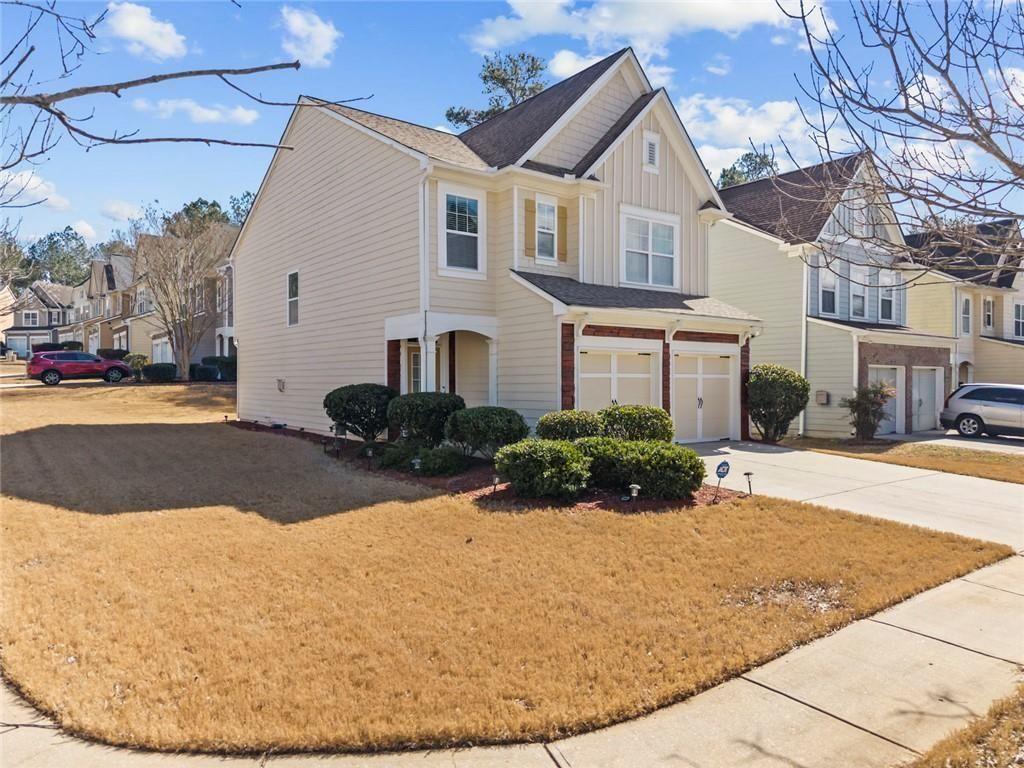 6066 Allpoint Way Fairburn, GA 30213 - Photo 9 of 43 a view of a white house with a outdoor space