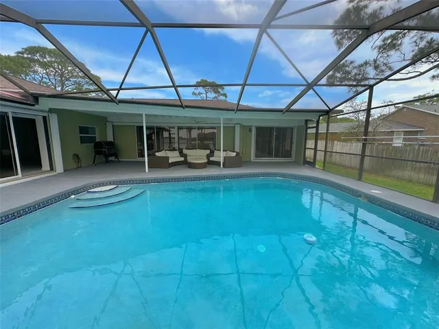 a view of a house with porch and wooden floor