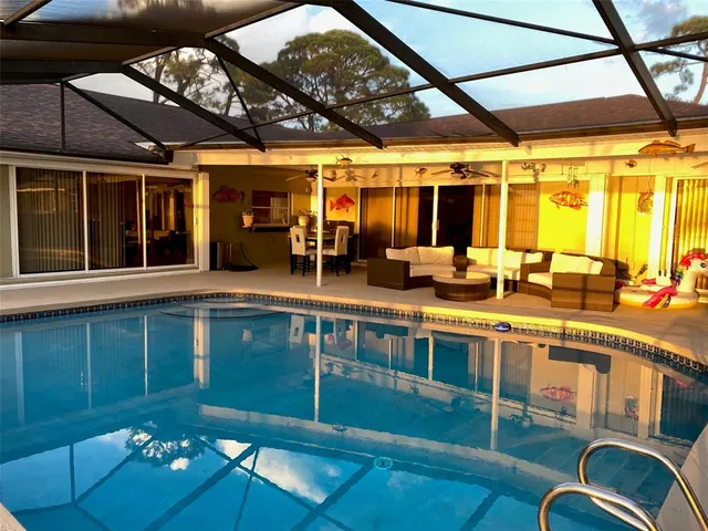 a kitchen with sink and window