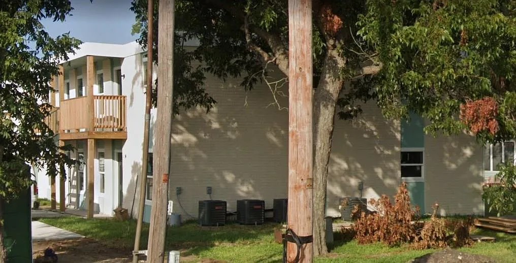 1109 East North Street, Unit 20 Victoria, TX 77901 - Photo 2 of 9 a backyard of a house with lots of green space