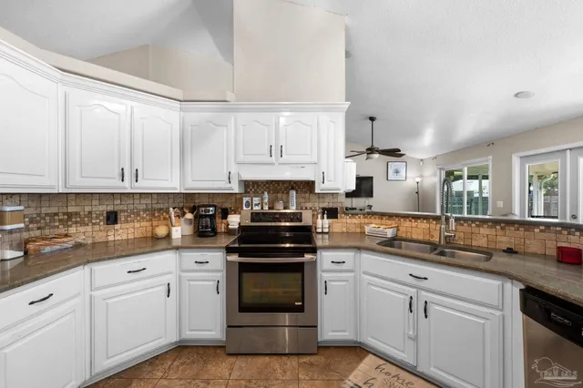 a dining room with furniture window and outside view