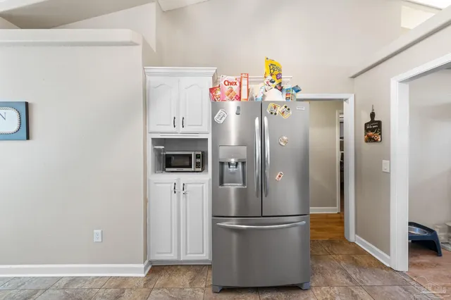 a view of a swimming pool with chairs