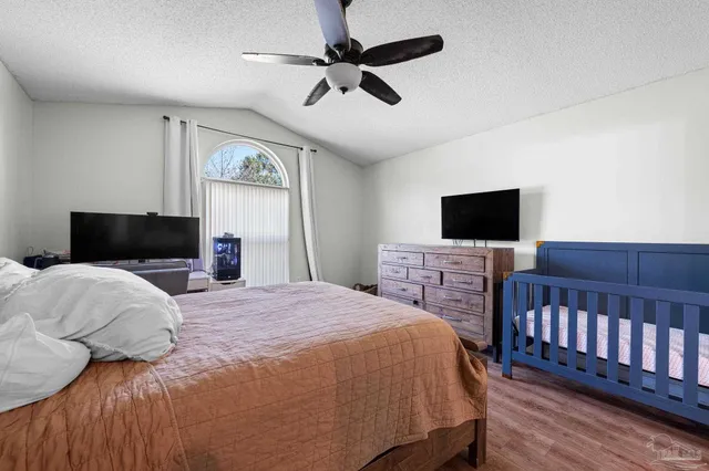 a front view of a house with yard