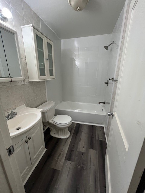 1241 Chevy Chase Drive Angleton, TX 77515 - Photo 13 of 21 a bathroom with a sink a toilet and a mirror