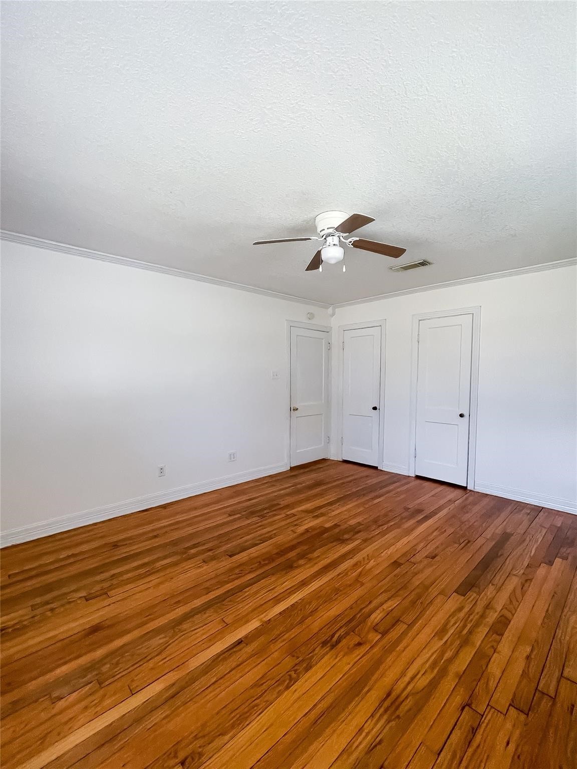 1241 Chevy Chase Drive Angleton, TX 77515 - Photo 7 of 21 a view of empty room with wooden floor