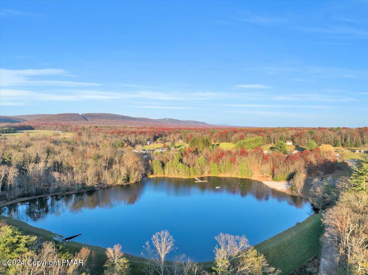 235 Bird Lane Kunkletown, PA 18058 - Photo 28 of 33 a view of a lake with a mountain