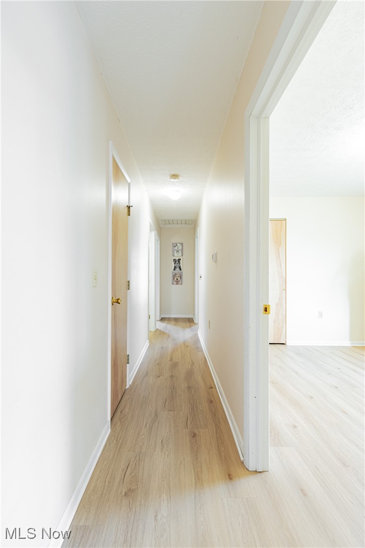 2643 Graham Road Stow, OH 44224 - Photo 7 of 30 Hall with light hardwood / wood-style floors