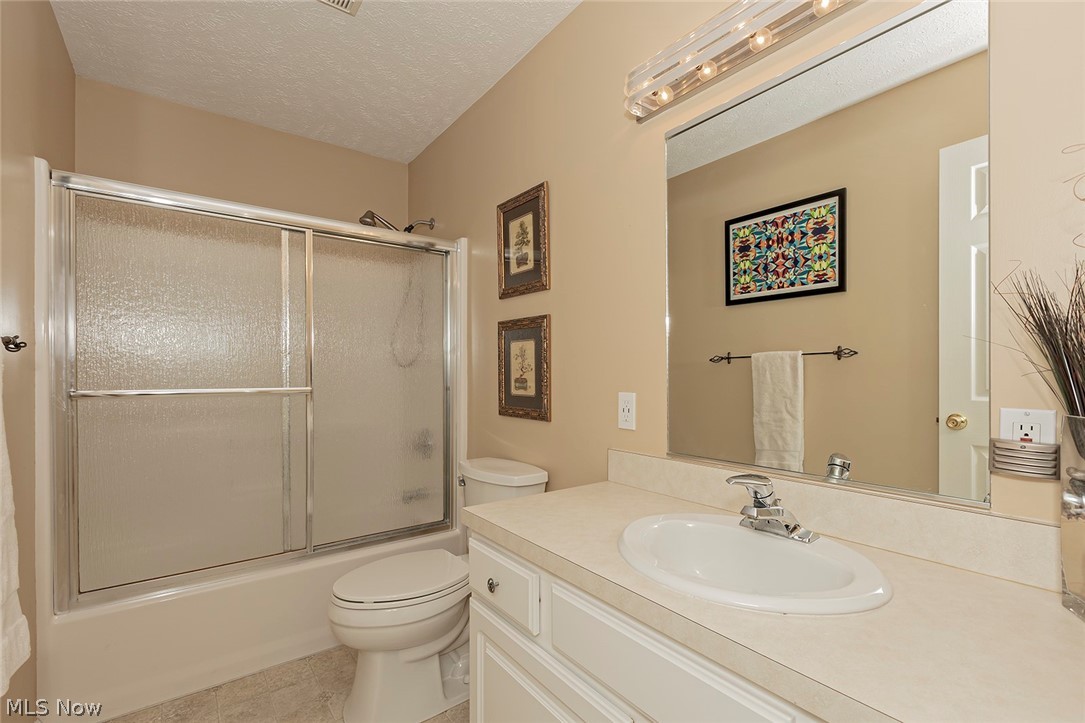 5420 Bartlett Road Bedford, OH 44146 - Photo 18 of 32 Full bathroom, shared by bedrooms 2 and 3.