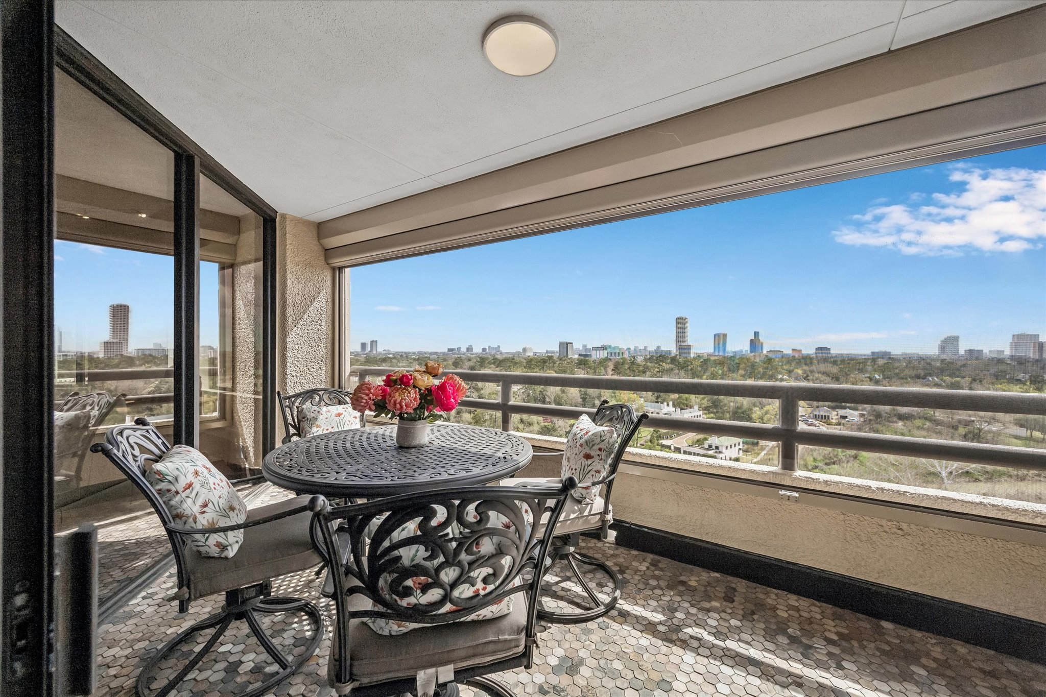 101 Westcott Street, Unit 1202 Houston, TX 77007 - Photo 7 of 40 Balcony shown with table.