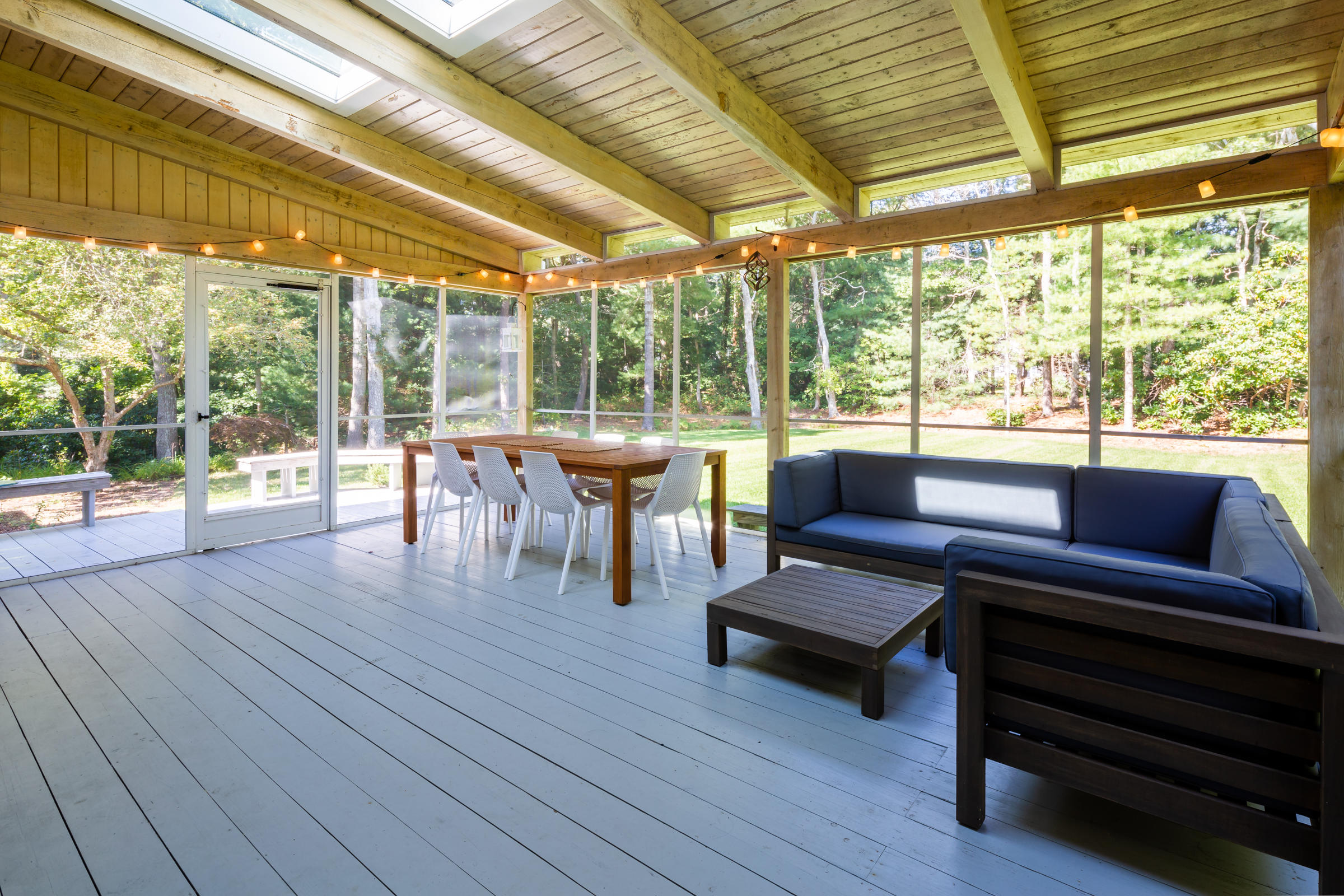 70 Leonard Road Osterville, MA 02655 - Photo 15 of 52 a living room with furniture and a large window