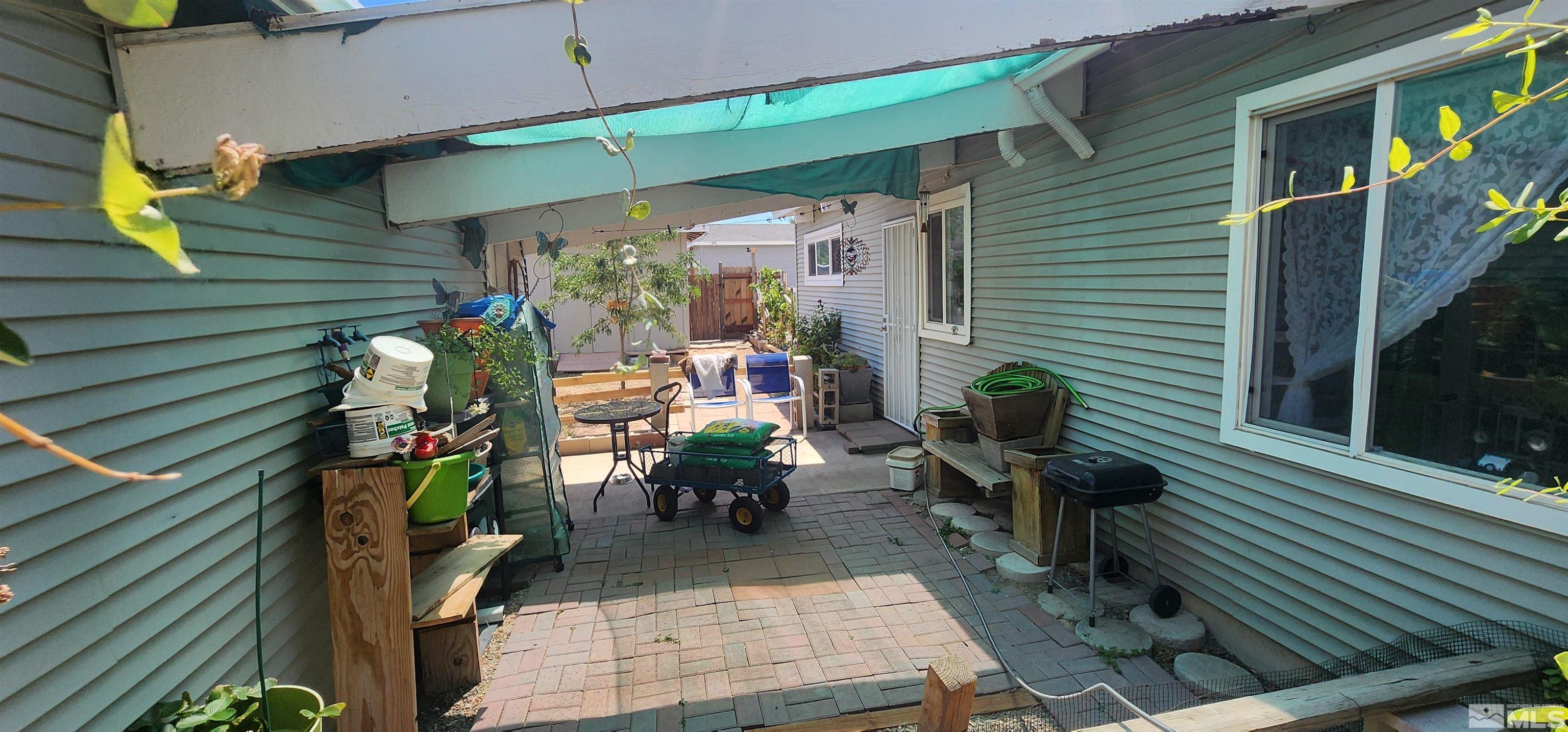 5330 Teton Street Reno, NV 89506 - Photo 7 of 11 a view of a chairs and table in a patio