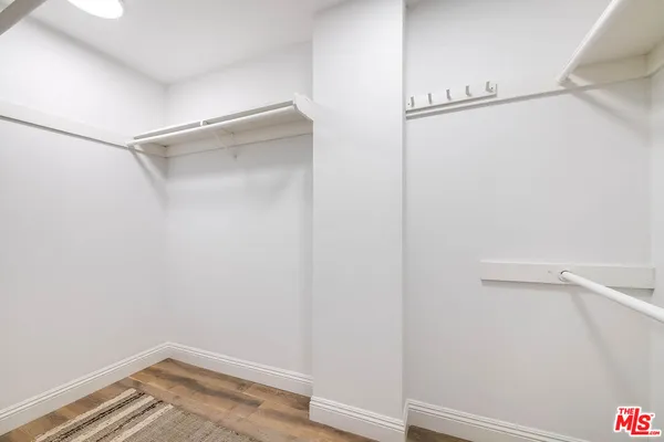 a view of an empty walk in closet