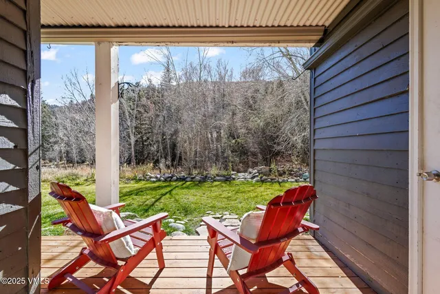 a view of a outdoor space with a table and chairs