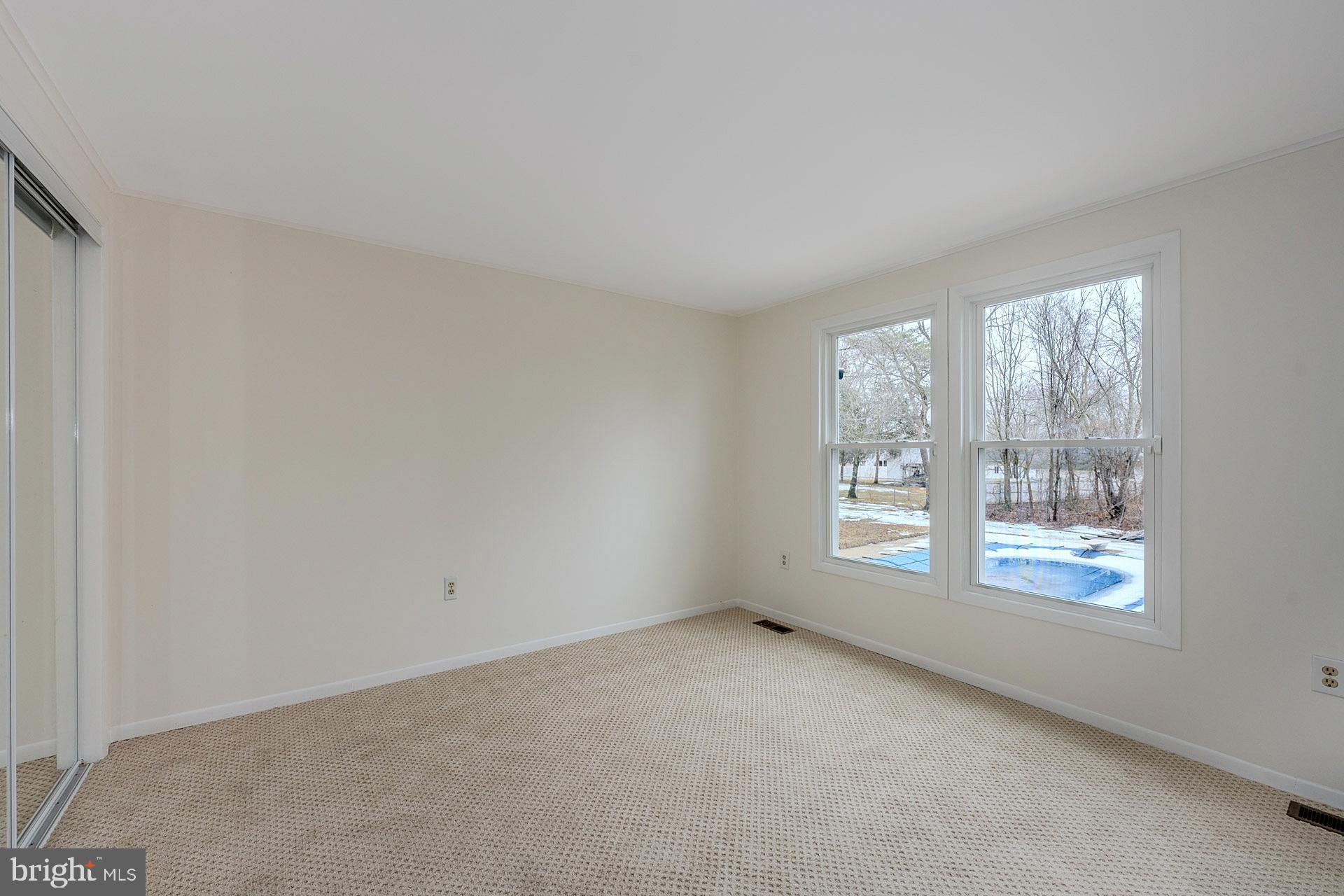 8414 Belding Court Brandywine, MD 20613 - Photo 19 of 37 a view of an empty room with a window