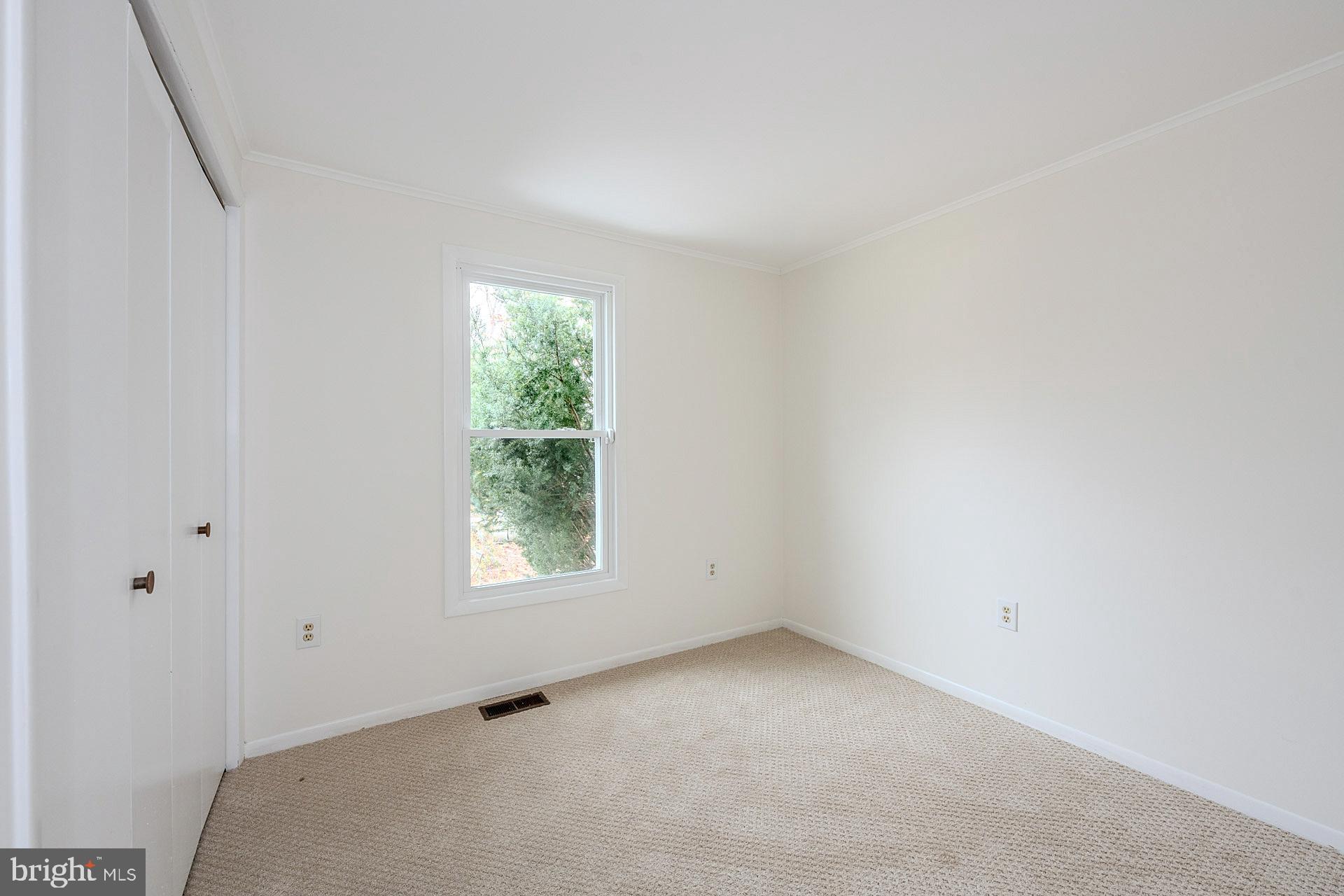 8414 Belding Court Brandywine, MD 20613 - Photo 22 of 37 a view of an empty room with a window