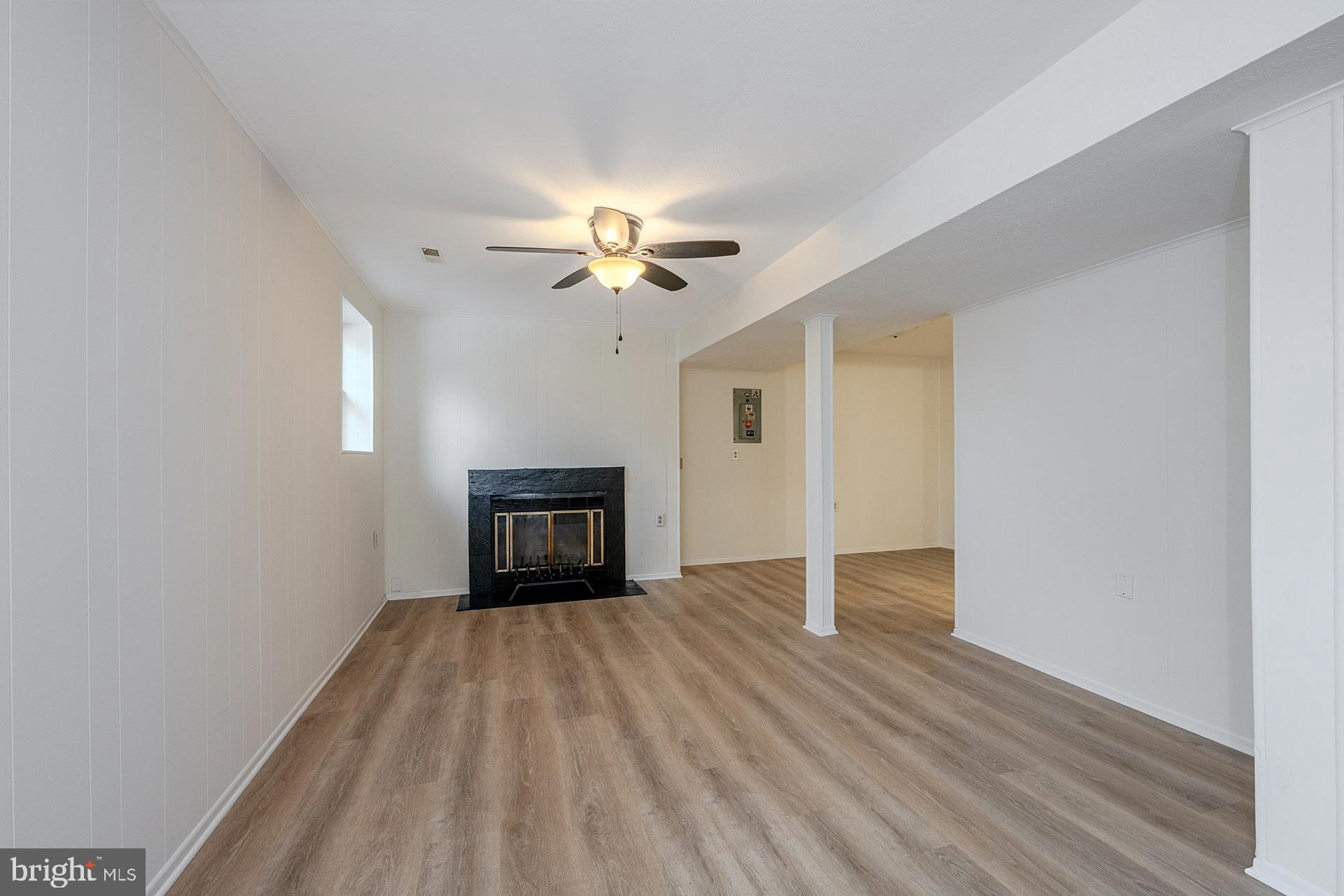 8414 Belding Court Brandywine, MD 20613 - Photo 26 of 37 wooden floor in an empty room with a window