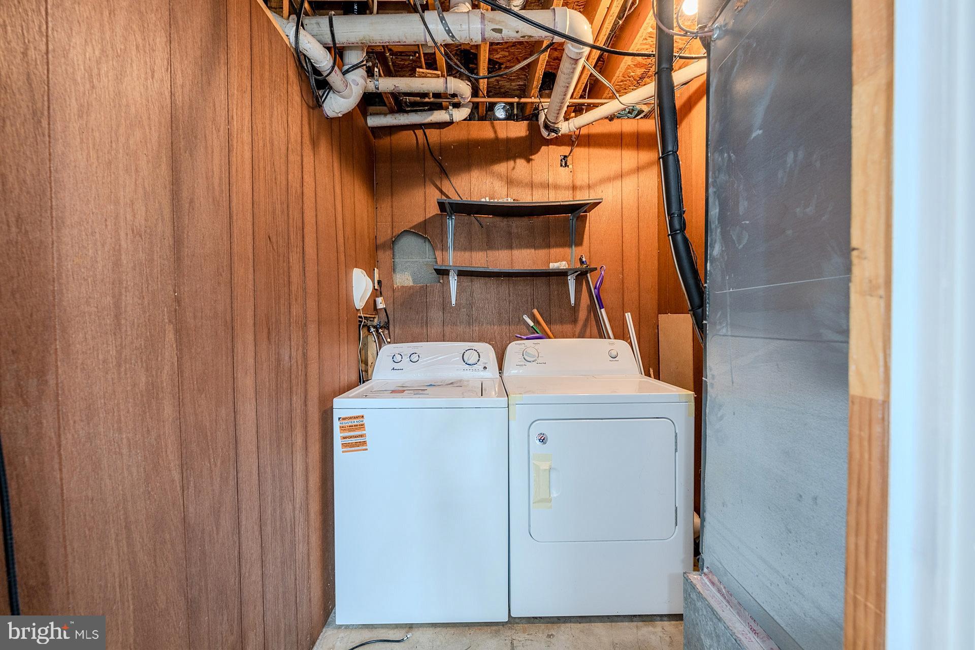 8414 Belding Court Brandywine, MD 20613 - Photo 29 of 37 a utility room with dryer and washer