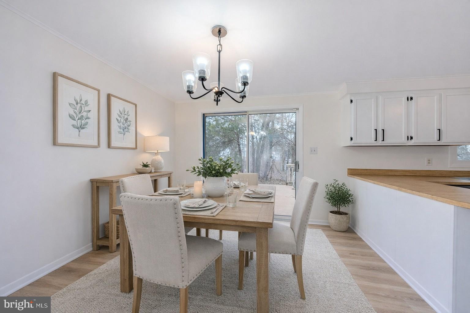8414 Belding Court Brandywine, MD 20613 - Photo 3 of 37 a view of a dining room with furniture window and wooden floor