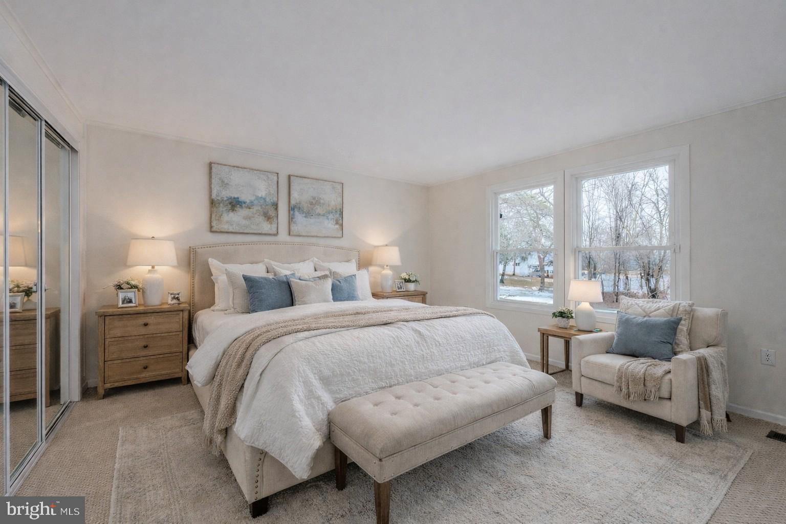 8414 Belding Court Brandywine, MD 20613 - Photo 4 of 37 a spacious bedroom with a bed and a couch