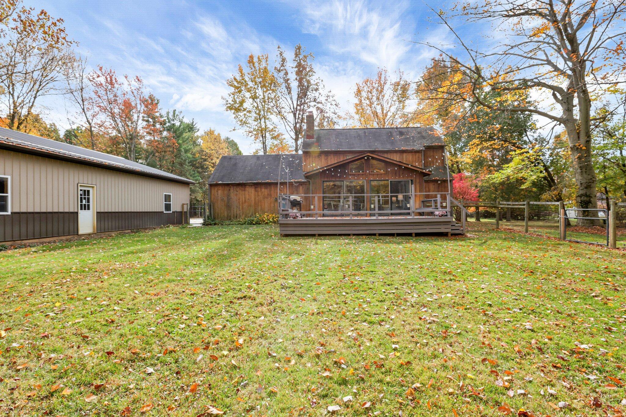 8058 Kennedy Road Blacklick, OH 43004 - Photo 38 of 69 Fenced in rear yard and deck with easy access to outbuilding