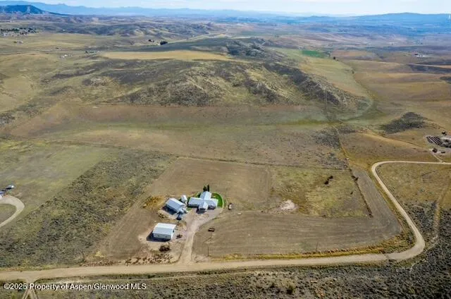 a kitchen with lots of counter top space and appliances