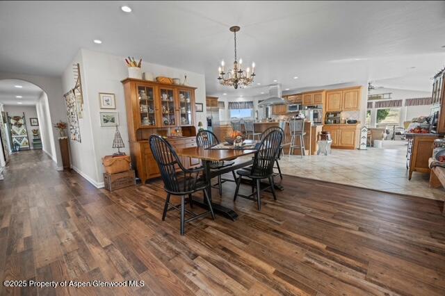 1040 Pronghorn Road Craig, CO 81625 - Photo 25 of 70 a view of a dining room with furniture wooden floor and chandelier