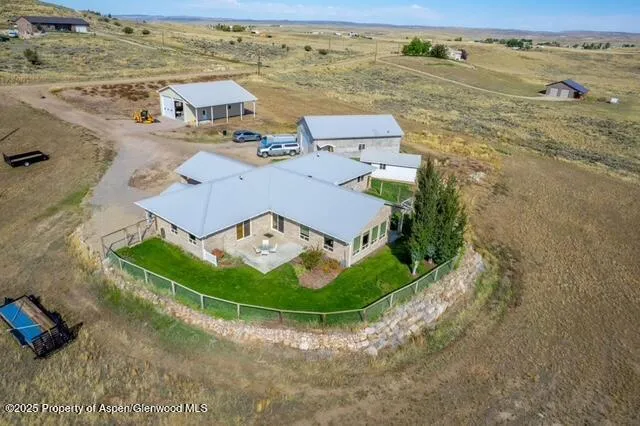 a view of a garage with parked cars