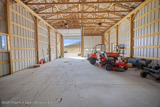 1040 Pronghorn Road Craig, CO 81625 - Photo 54 of 70 a view of a garage with parked cars