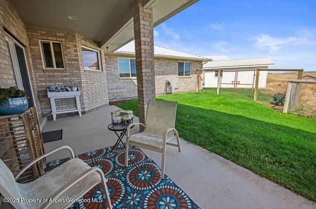 1040 Pronghorn Road Craig, CO 81625 - Photo 6 of 70 a view of an chairs and table in the patio