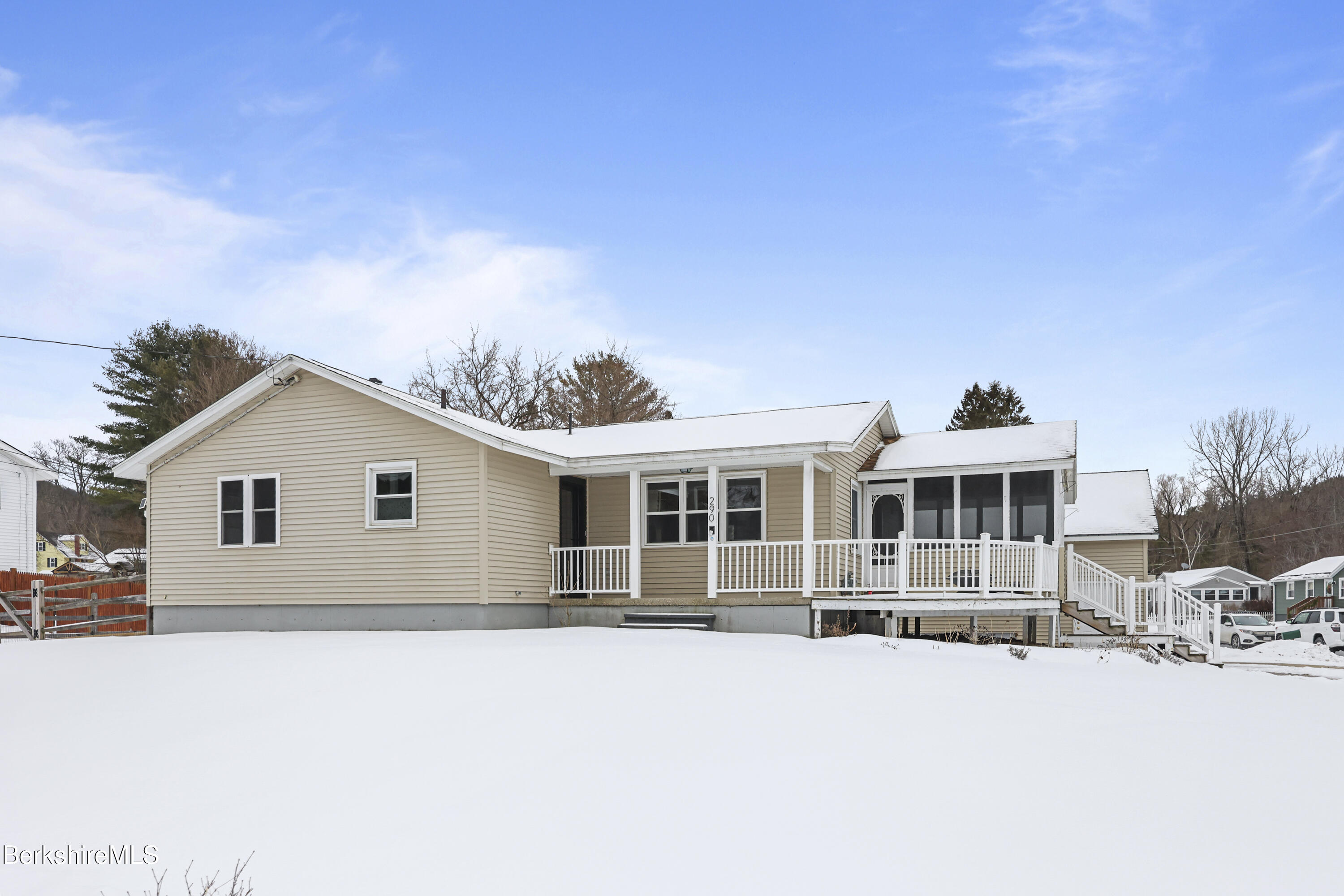 290 East Center Street Lee, MA 01238 - Photo 1 of 47 a front view of a house with a yard