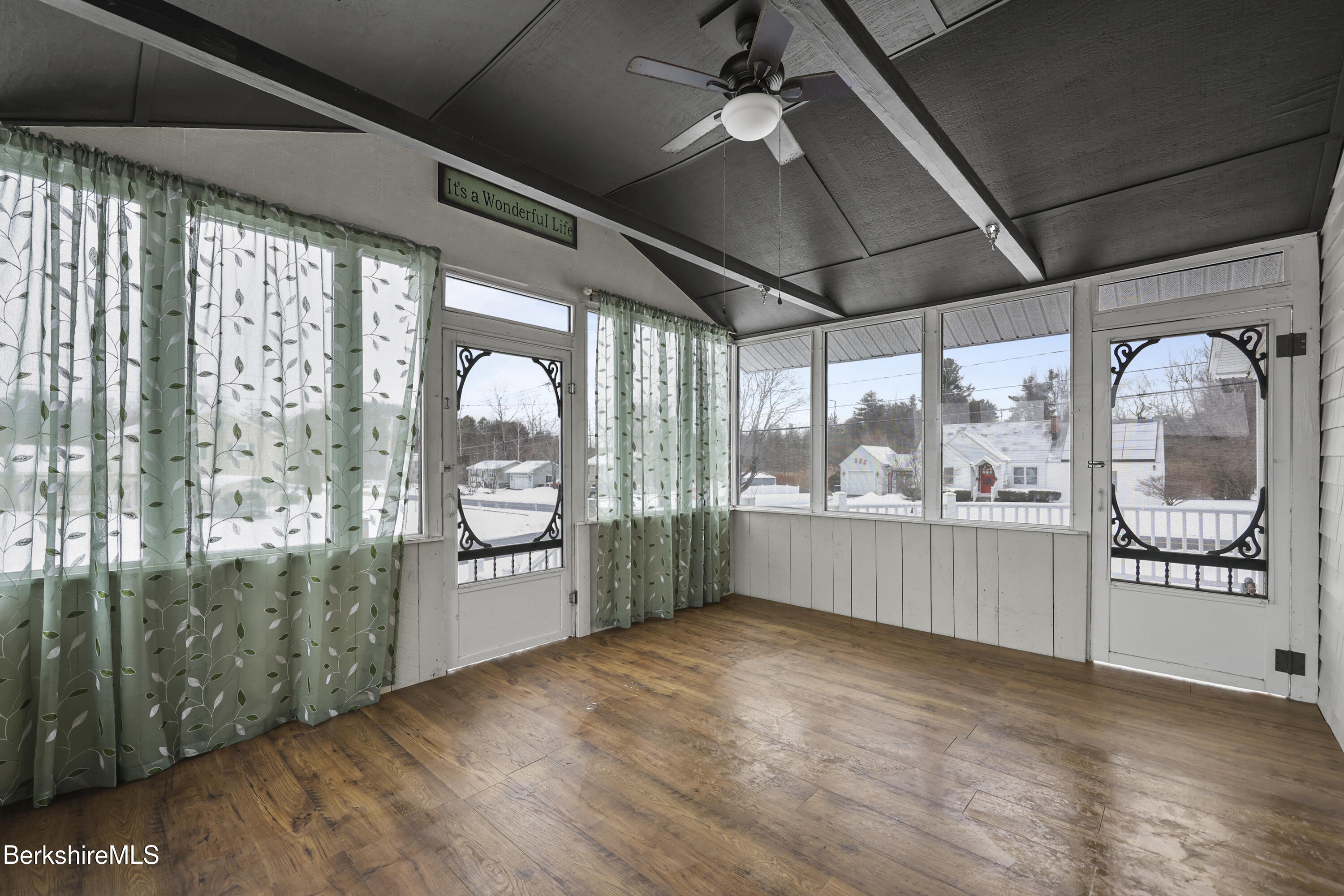 290 East Center Street Lee, MA 01238 - Photo 23 of 47 a area with wooden floor and doors