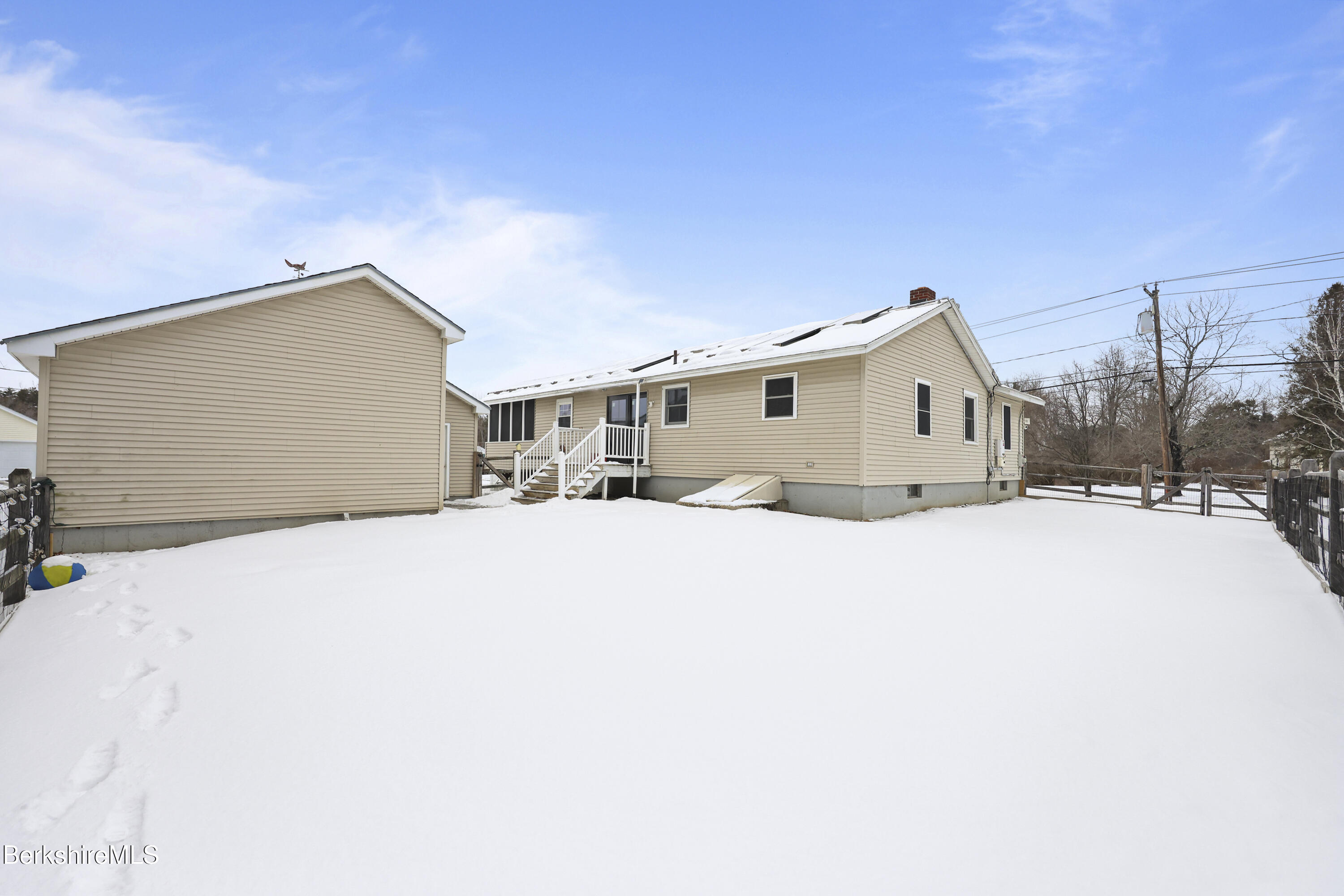 290 East Center Street Lee, MA 01238 - Photo 39 of 47 a view of house with a snow in front of yard